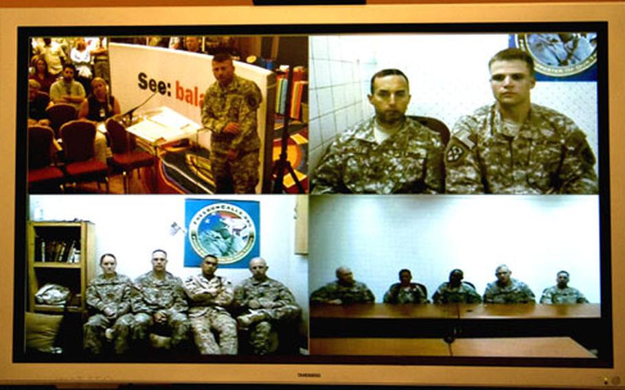 Servicemembers planning to run in shadow races at locations in the Mideast talk to reporters by teleconference.