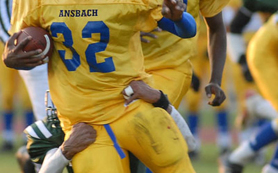 Ansbach&#39;s Xavier Sheppard tries to excape an AFNORTH defender in last year&#39;s Division III final. This year, Sheppard and his Ansbach teammates, the only undefeated team in DODDS-Europe, will face defending Division II champ Bitburg in this year&#39;s Division II title game at Baumholder.