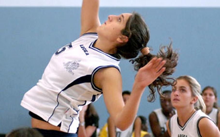 Ilaria Montanari, a sophomore from Marymount International School in Italy, spikes Thursday during the opening day of Championship play in Vogelweh. Div. III Marymount defeated American Overseas School of Rome 25-19, 26-24 in a Division III contest.
