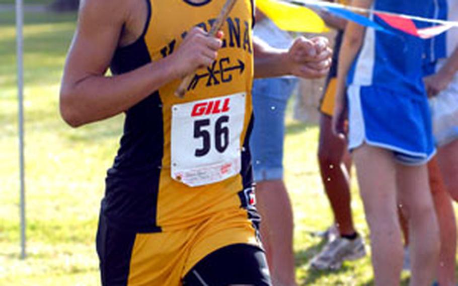 Kadena junior Brant Casteel tracks across the finish line after Tuesday&#39;s 6.2-mile team relay portion of the 2007 Far East High School Cross-Country Meet.