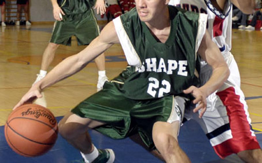 SHAPE senior Joe McGee drives around Darius Wynn of Bitburg.