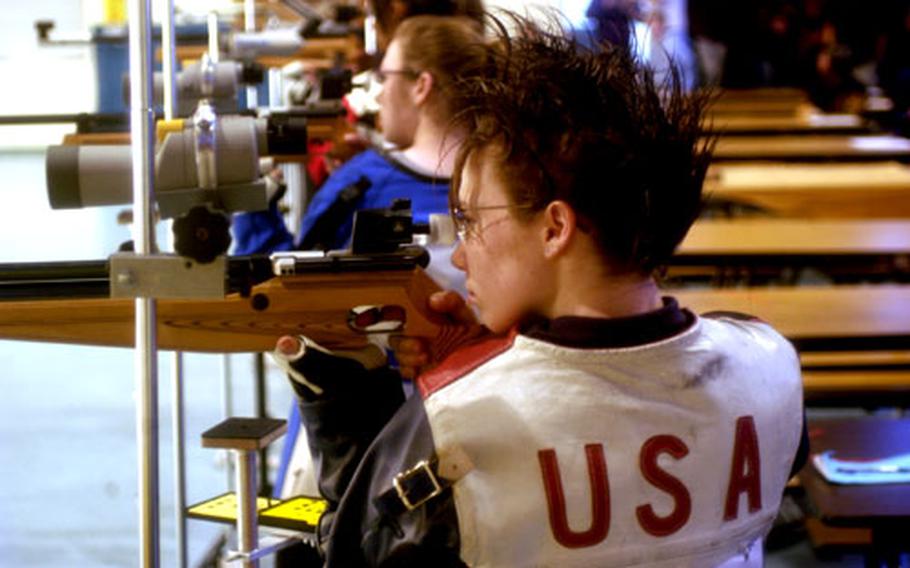 Sarah Adams of Hohenfels takes aim during the final-round shootout for the top individual scorers of the USAREUR/DODDS Rifle Championships on Saturday in Stuttgart, Germany.