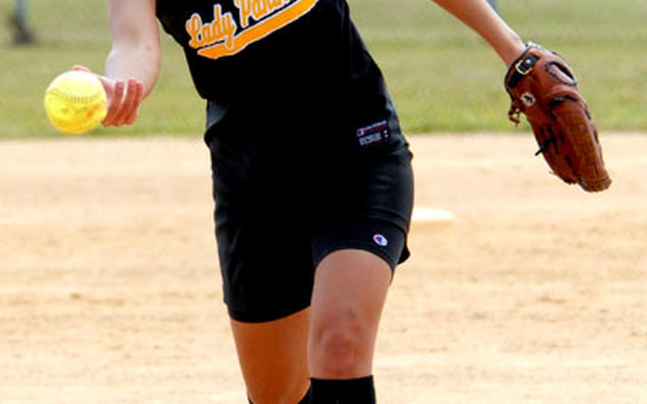 Brooke Hudson of the Kadena Panthers delivers against the Kubasaki Dragons Saturday. Hudson got the complete-game victory, surviving nine hits and five walks while striking out one as the Panthers rallied from a 5-2 sixth-inning deficit for seven unearned seventh-inning runs and a 9-5 victory.