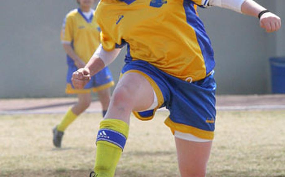 Erica McInnis of the Yokota Panthers heads the ball against the Robert D. Edgren Eagles during Saturday&#39;s DODDS-Japan Soccer League girls match at Trojans Field, Zama American High School, Camp Zama, Japan. Yokota edged Edgren 3-2.