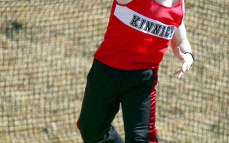 Nile C. Kinnick sophomore Dereck Youngblood throws the discus during Saturday&#39;s 2008 Zama American High School Invitational Track and Field Meet at Camp Zama, Japan. Youngblood took third place with a throw of 24.69 meters.