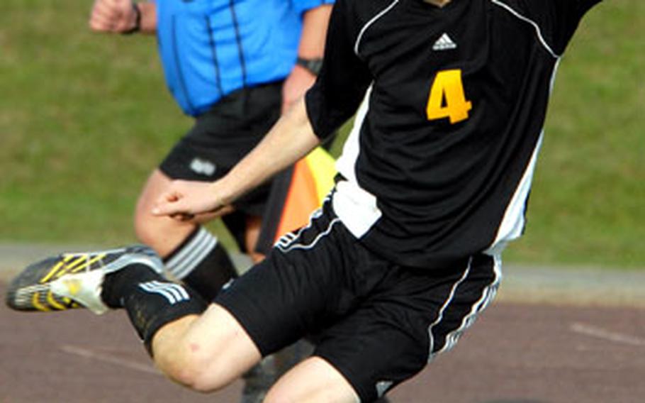 Kadena&#39;s Stanley Schrock prepares a crossing pass against Kubasaki. Schrock scored twice in a losing cause.