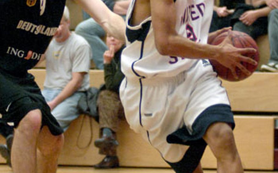 Travis Releford, from Bishop Milage High School in Los Angeles, drives to the hoop during an exhibition game Thursday night against Germany at the Mannheim Sports Arena. Releford had 13 points as the U.S. team defeated Germany 80-69 on Thursday.