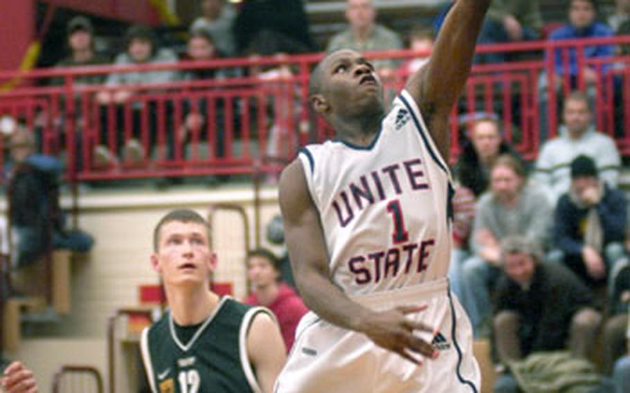 Irving Walker, a senior from Rice High School in Middle Valley, N.Y., lays up two of his 21 points during an exhibition game Thursday night against Germany.