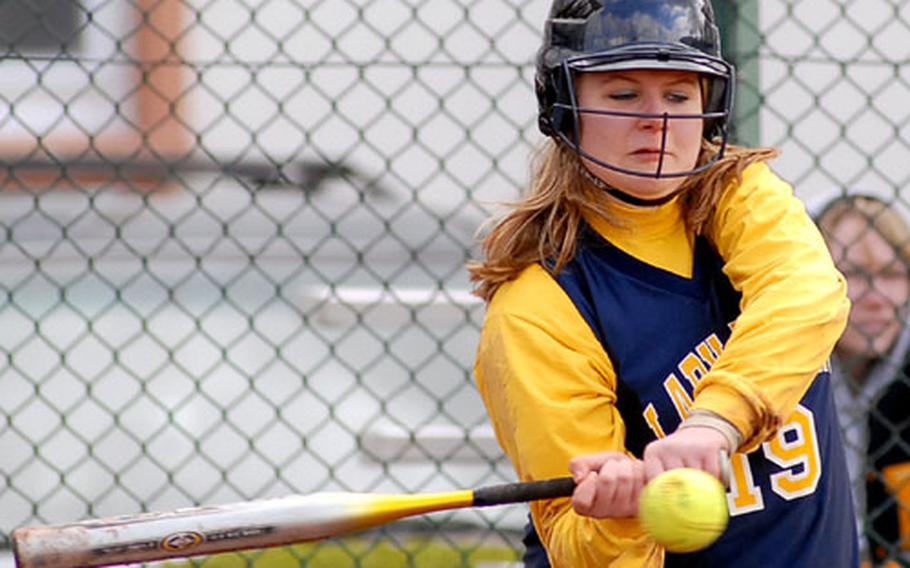 Heidelberg&#39;s Kelsey Little keeps her eyes on the ball as she gets ready to connect in the second game of Saturday&#39;s doubleheader against Mannheim.