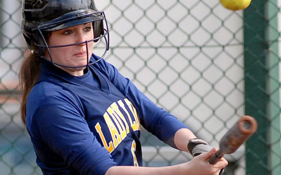 Heidelberg&#39;s BriAnn Joyner connects with a pitch in the second game of Saturday&#39;s doubleheader against Mannheim.