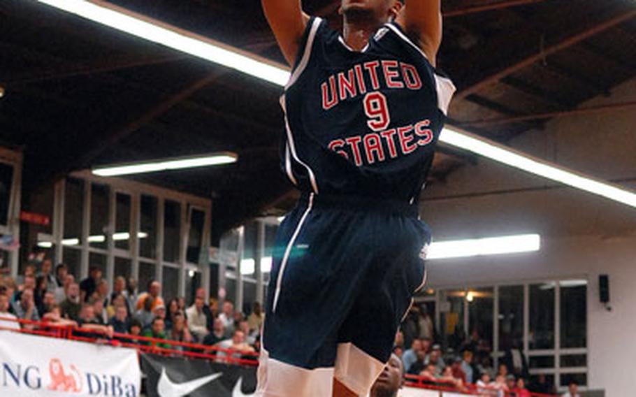 Travis Releford of the United States scores on the end of a fast break in the Americans&#39; game against Israel on Saturday night. Releford scored 17 points as the U.S. beat Israel 83-61 in their opening day game at the 2008 Albert Schweitzer International Youth Basketball Tournament, in Mannheim, Germany.