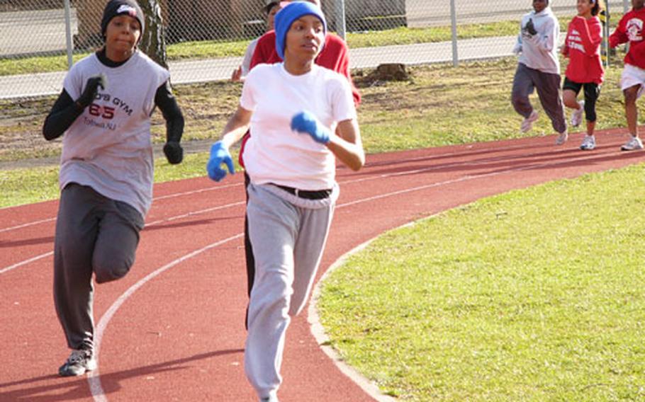 European 800-meter champion Marche Bobbs leads her teammates through a curve during a workout Tuesday in Kaiserslautern, Germany.