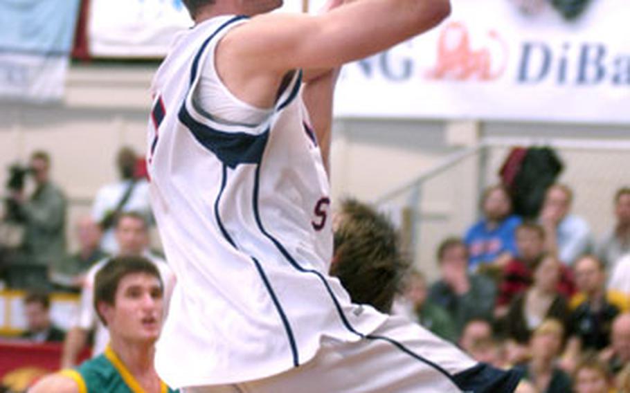 Team USA&#39;s Jeffree Withey of San Diego, Calif., scores an easy lay-up against Australia.