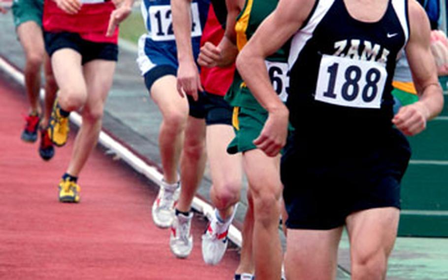 Zama American&#39;s distance specialist, Andrew Quallio, takes command on the first lap of the boys mile. Quallio won the event in a meet-record 4:37.57, topping the old mark of 4:46.8 set by Tim Nabonne of Kadena two years ago.