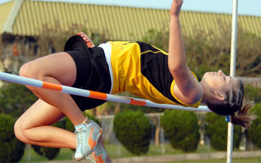 Sophomore Shannon Steele of the Kadena Panthers clears 4 feet, 7¾ inches in the high jump portion of Friday&#39;s 2008 Okinawa Activities Council district track and field meet. Steele finished second to Kelly Colbert of Zion Christian Academy, who cleared 4-10½.