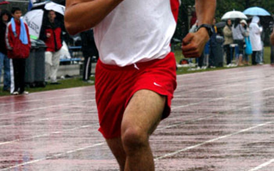 Nile C. Kinnick High School junior Cliff Collins sprints toward a fourth-place finish in the 800 meters Saturday at the Kanto Plain Association of Secondary Schools track and field championship on Yokota Air Base, Japan.