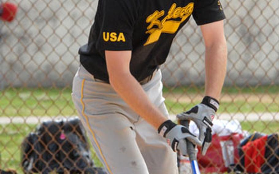 Kadena Panthers&#39; Jared McNeal delivers eyes his run-scoring fifth-inning double against Naha Spirit during Saturday&#39;s high school baseball game at Chibana Recreation Center, Okinawa. Spirit won 9-2.