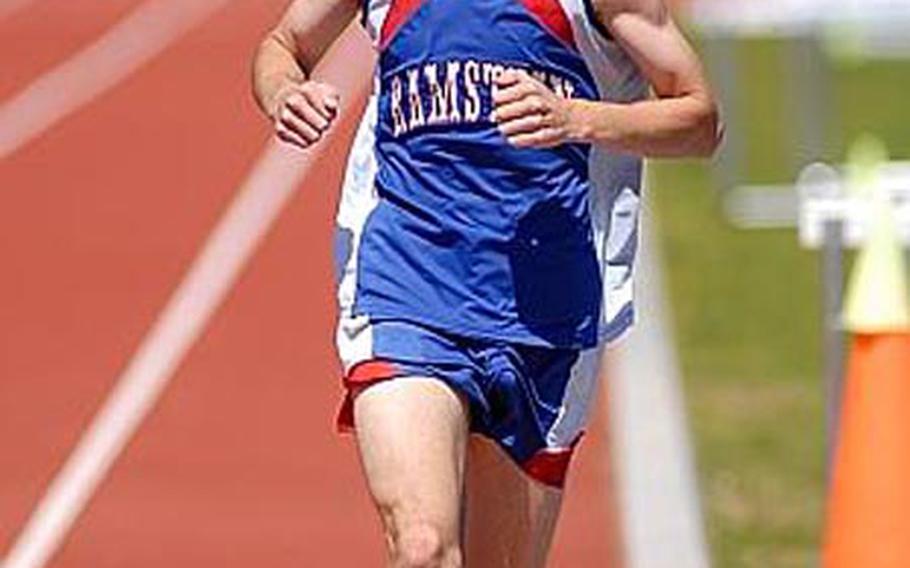 Kel Secrest of Ramstein leads the pack on his way to winning the 800-meter event on his home course, on Saturday. He also won the 1,500-meter and 3,000 meter events, and has qualified for all three events in the upcoming European track and field championships.