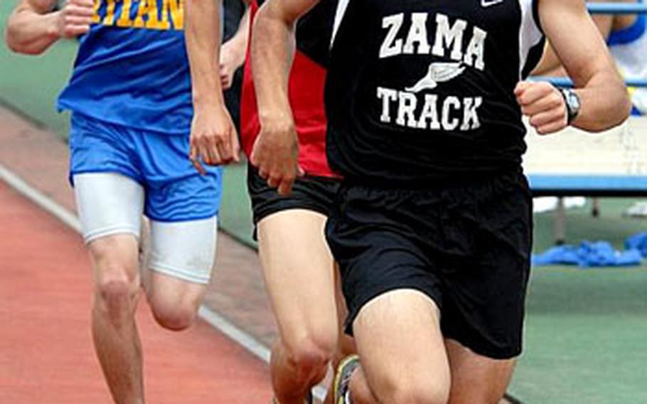 Zama American Trojans junior Andrew Quallio, right, leads the pack, including Seoul Track Club&#39;s John Lohr and St. Mary&#39;s International Titans&#39; Kelly Langley in the 3,200-meter portion of Saturday&#39;s 2008 Kanto Plain meet. Quallio won the two-mile in 10:04.9 and the mile in a Pacific-best and meet-record 4:29.4.
