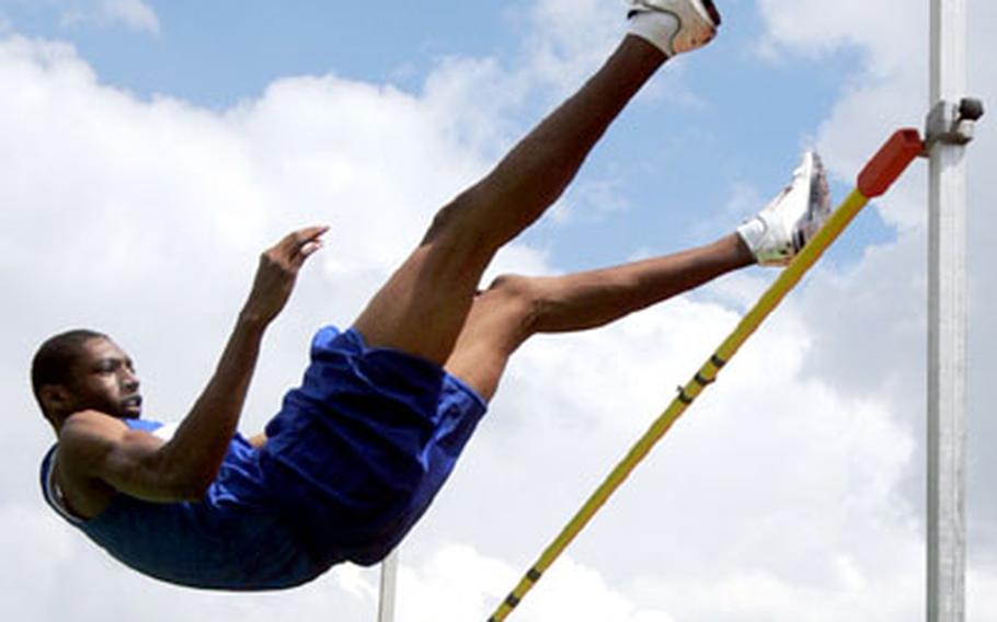 Colby Baskins of Hohenfels clears 6&#39;2" inches to win the high jump.
