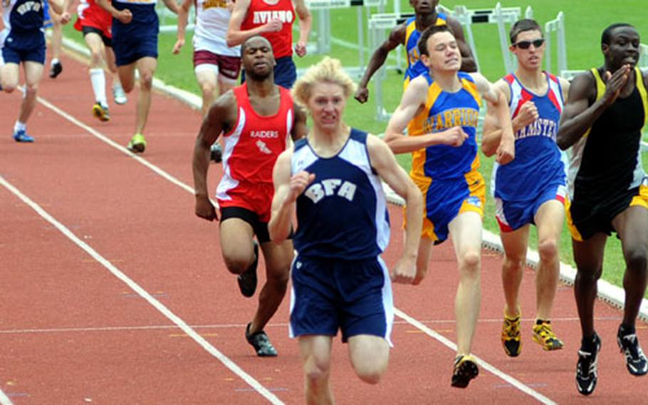 Trevor Hope of Black Forest Academy wins the 800 meter final in 2:02.13, ahead of Wiesbaden&#39;s Kyle Murray, far right.