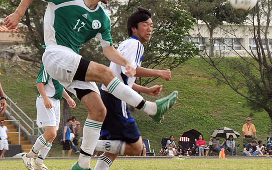 Kubasaki High School&#39;s Bryan Shibley (17) kicks the ball down the field durng the championship game against Christian Academy in Japan during the 2008 Far East Boys Soccer Tournament on Friday. Kubasaki won, 1-0.