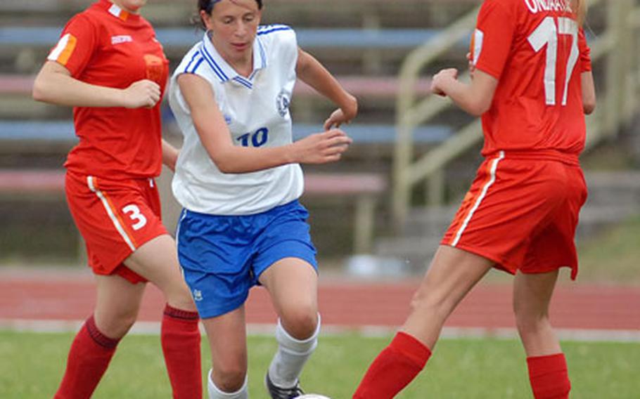 Marymount&#39;s Elena Carrarini splits the defense of AOSR&#39;s Jillian Kneeland, left, and Anna Ondaatje in an all-Italy girls Division III soccer final. Marymount won 3-1 in overtime.
