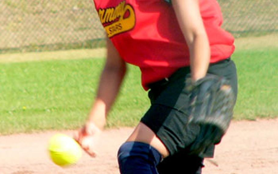 Kaiserslautern Military Community starter Autumn Diaz, a rising freshman at Bitburg High School, delivers Saturday during KMC’s 24-2 loss to Russia.