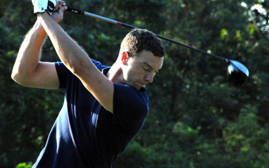 Spc. Weston Fenner of K-16 Air Base hits the ball during the Asia Zone Long Drive Competition at Sungnam Golf Course on Saturday. The winner of that competition will advance to the Military Long Drive Championship in Nevada to compete for a $10,000 prize against five other U.S. military golfers from around the world.