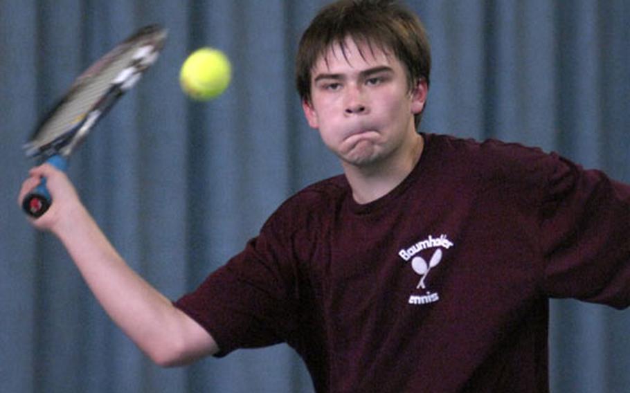 Steven Billington, a senior from Baumholder High School, returns a volley against Michael Boone of Kaiserslautern Saturday at an indoor court in Weilerbach, Germany. After a slow start, Boone dialed up his game to defeated Billington 2-6, 6-4, 6-1.