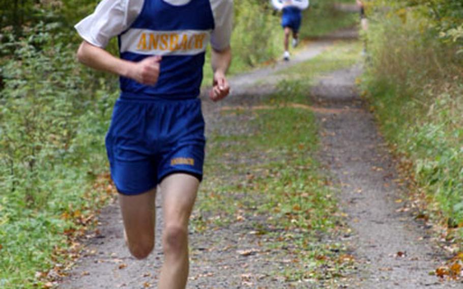 Ansbach senior Sterling Teall has the trail all to himself en route to a course record Sept. 27 at Munich International School.