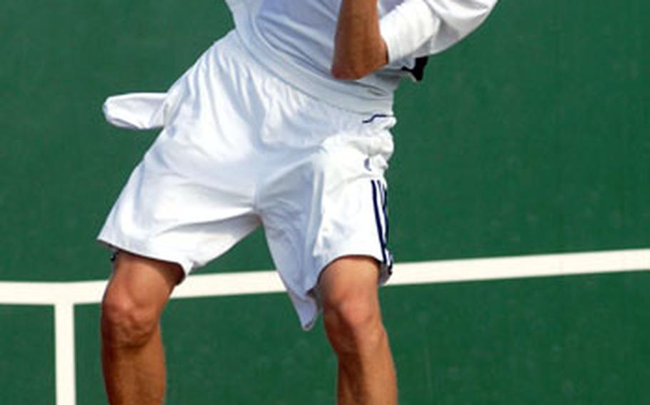 Kadena junior Kyle Sprow serves it up to Kadena junior Eliott Mason during Thursday&#39;s boys singles championship match in the 2008 DODDS-Pacific Far East High School Tennis Tournament at Kadena Air Base, Okinawa. Sprow successfully defended his title, beating Mason 6-2, 6-2.