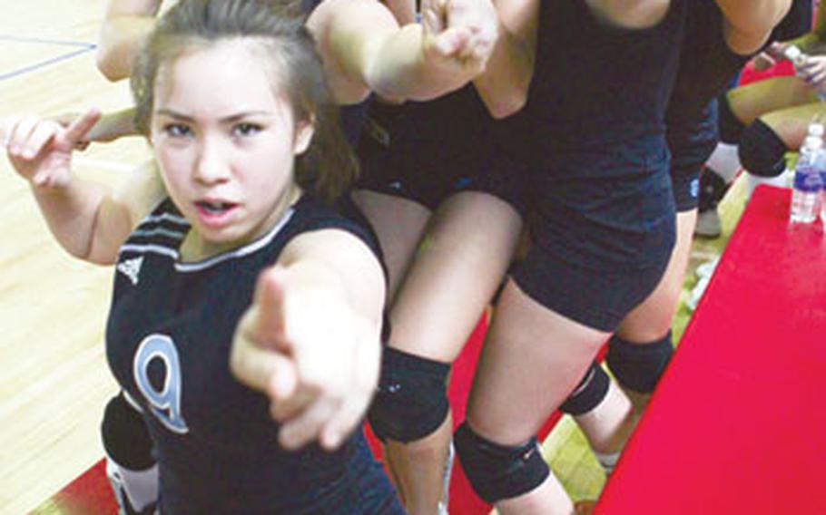 Osan American Cougars players celebrate after winning Friday’s championship match over Morrison Christian Academy in the 2008 DODDS-Pacific Far East High School Girls Class A volleyball tournament at Kelly Fitness & Sports Center, Camp Walker, Daegu, South Korea. Osan repeated its tournament title of a year ago, beating Morrison in four sets in the second match of a two-match final.