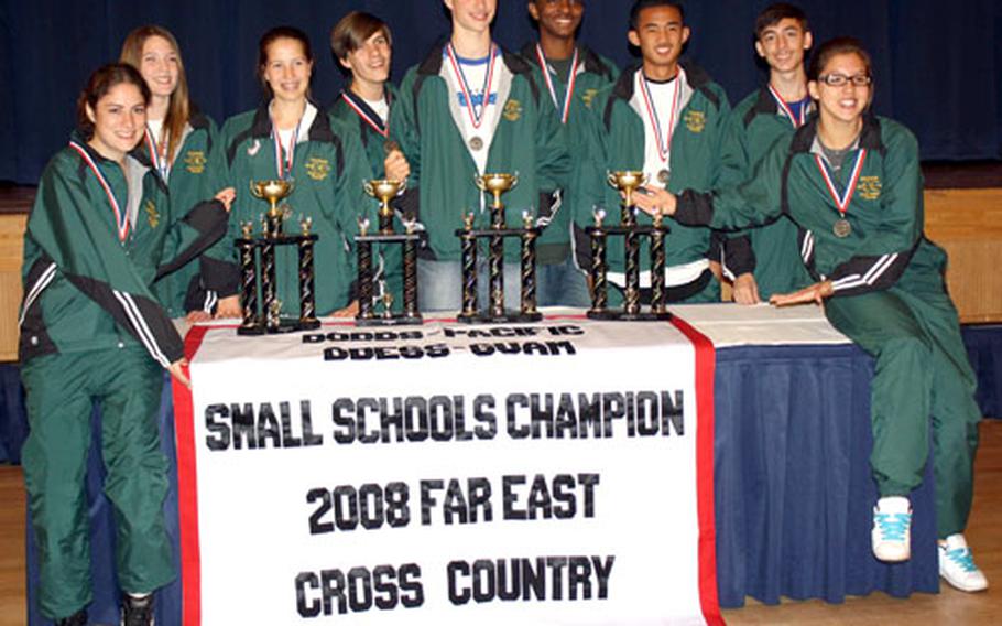 Robert D. Edgren cross-country runners display their title wares Nov. 4 after the 2008 DODDS-Pacific Far East high school cross-country Meet.