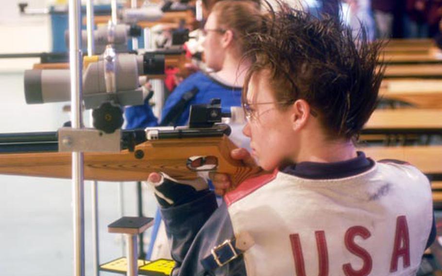 Sarah Adams of Hohenfels takes aim during last season’s rifle championships in Stuttgart, Germany. She is among the top shooters back for the two-time defending champ.