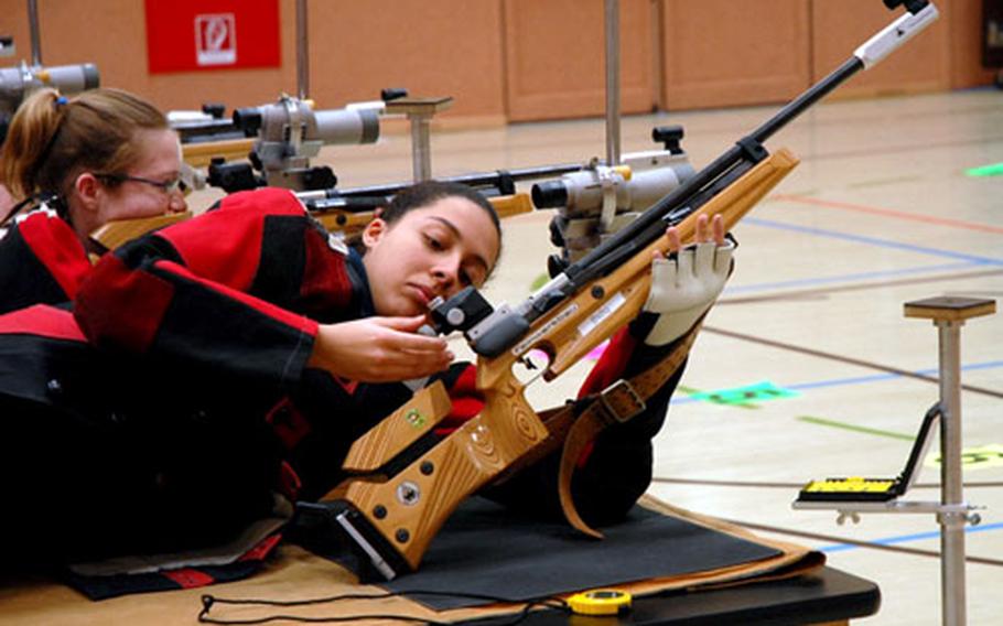 Jessica Walloch of Hohenfels High School adjusts her rifle sight Saturday during the DODDS-Europe Marksmanship Championships at Vilseck High School. Walloch won top shooter of the year and day, and led her team to a second-place finish at the championship event.