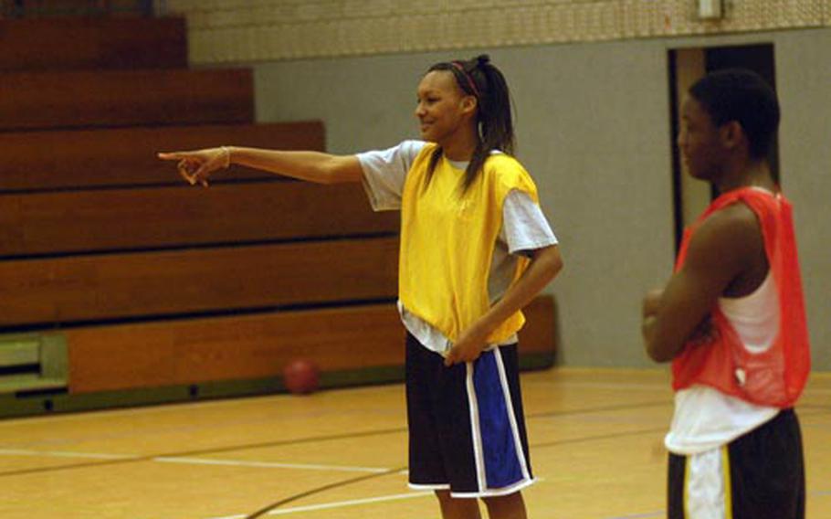 Patch senior Adrianna Archie, left, has her Lady Panthers pointed in the right direction as they enter the DODDS-Europe girls basketball tournament.