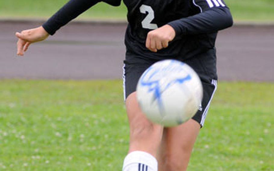 Kadena freshman wing Stephanie Mobley sends a crossing pass in front of the net against Yomei High School, a Japanese team, during Saturday&#39;s season-opening high school girls soccer game at Kadena Air Base, Okinawa. Mobley had a goal and an assist as Kadena blanked Yomei 9-0.