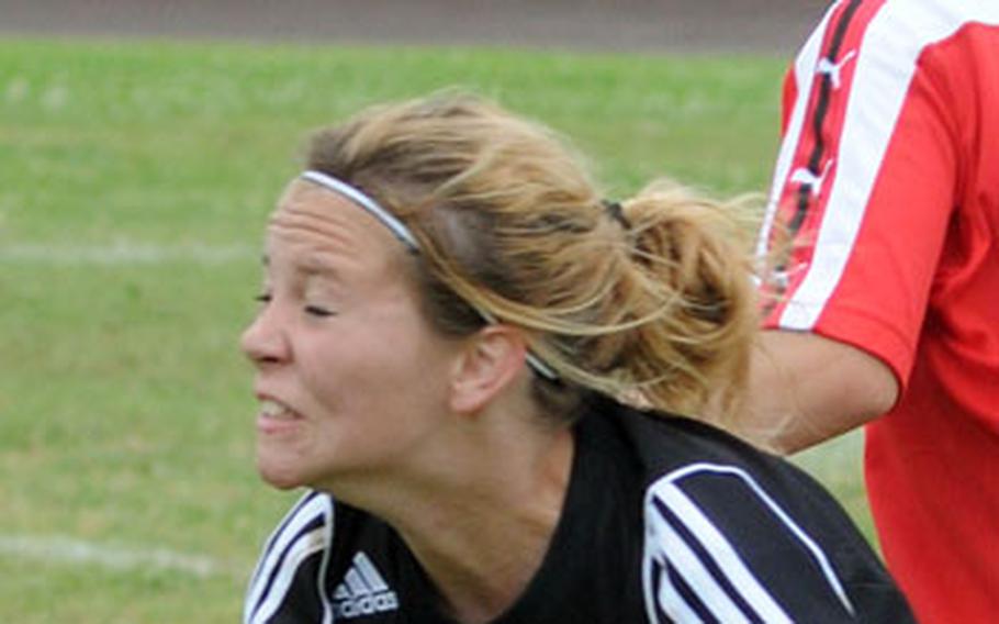 Kadena freshman striker Kristie Kariban heads the ball against Yomei. Kariban had a goal and three assists.