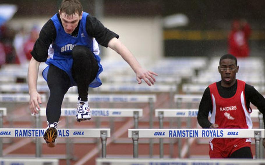 Corey Armstrong of Bitburg heads for a win in the 100-meter hurdles, an event in which he was competing for the first time.