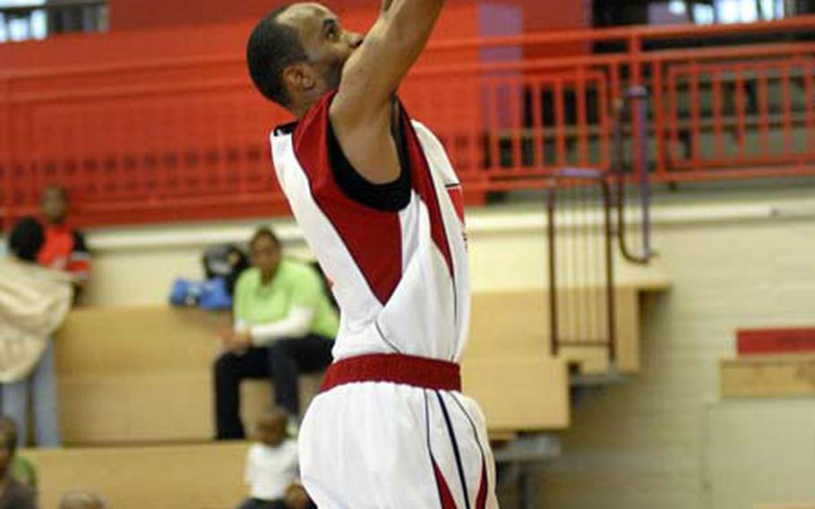 Reginald Hawkins from Mannheim sails in for a big dunk Sunday in the last minute of their championship game against Kaiserslautern at Mannheim&#39;s sports arena. Mannheim beat out Kaiserslautern 73-57 clinching the men&#39;s U.S. Army Europe title. Hawkins was named the tournament MVP for the men.