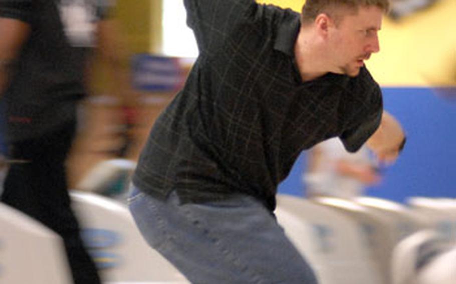 Kevin Reasoner from Grafenwöhr slides through his stride Friday on the final day of the U.S. Forces bowling tournament in Heidelberg. Reasoner was the all-events men’s champion with a score of 3,969, 51 points better than runner-up Holton Stallworth of Hohenfels.