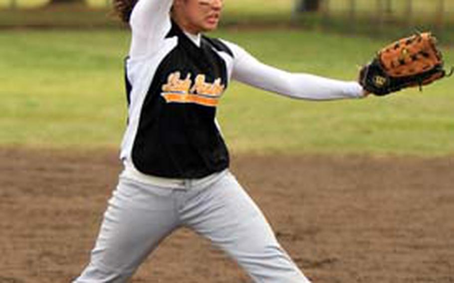 Kadena Panthers right-hander Mary Schweers readies to deliver against the Nile C. Kinnick Red Devils during Saturday&#39;s championship game in the 2009 DODDS-Japan Girls Softball Tournament at Naval Air Facility Atsugi, Japan. Schweers pitched a complete-game victory and Kadena beat Kinnick 11-4 for the title.