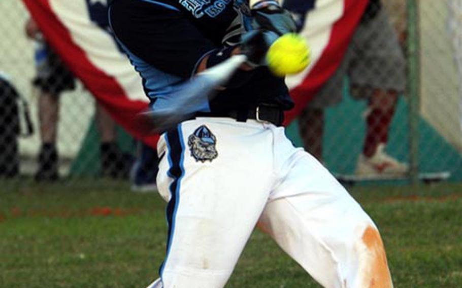 All-Army infielder Buck Buchanan of Camp Humphreys, South Korea, takes his cuts against Yokota Air Base, Japan, during Thursday's pool-play game in the 2009 Firecracker Shootout Interservice Softball Tournament at Gunners Fitness & Sports Center Softball Fields, Camp Foster, Okinawa. Humphreys edged Yokota 9-8.