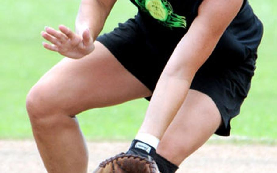 Shortstop Marcy Erickson of Pitchslap of Okinawa fields a ground ball against Yard Busters.