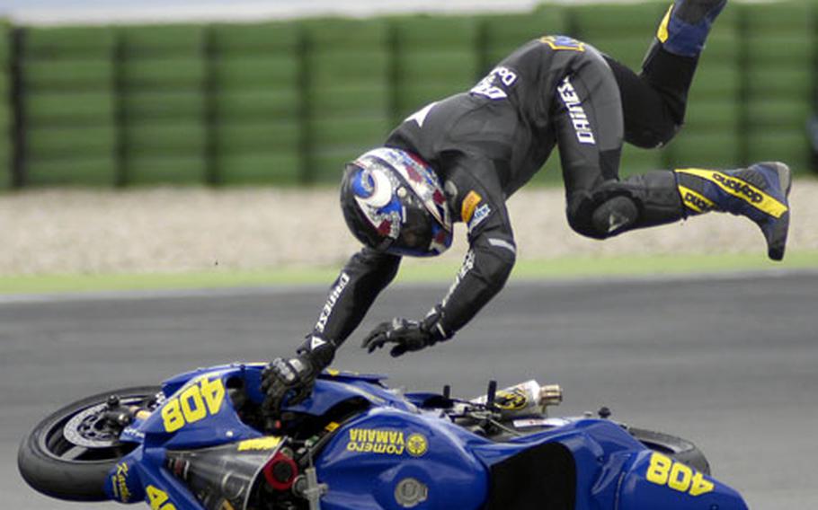 Karthin Kjel crashes on a tough curve halfway through the 600cc Seriensport Challenge Saturday at Hockenheimring.