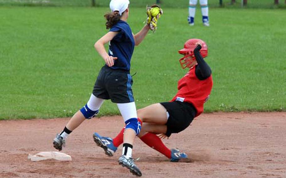 KMC Senior League All-Star Maddie Byrd steals second before Georgia&#39;s Jujuna Churadze can get down with the tag. KMC swept Georgia in a best-of-seven series with a 12-2 win at Ramstein on Wednesday. The victory sends KMC to the Senior League Softball World Series next month in Lower Sussex, Del.