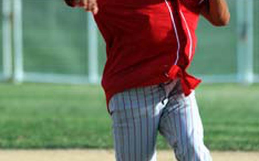 Michael Montoya Sr., along with his son Michael Jr., of host Marine Corps Base Camp S.D. Butler, are believed to be the first father-son tandem to ever suit up in the Marine Corps Far East Regional Softball Tournament.