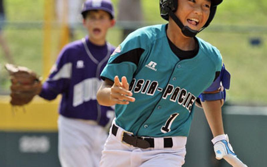 Taiwan&#39;s Yu Chieh Kao (1) rounds second base past Germany&#39;s second baseman Chris Holba after hitting a grand slam off Germany pitcher Cannon Byrd in the first inning.