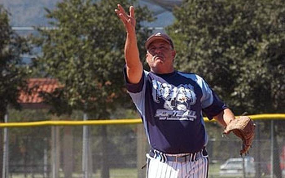 Longtime RAF Lakenheath pitcher Joe Hacker delivers to a Spangdahlem batter Sunday in the championship game of the U.S. Air Forces in Europe softball tournament. Hacker was named most valuable player in the tournament — the final one the service is having before the format changes next year.